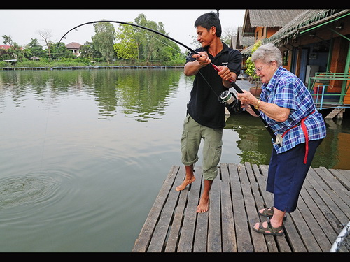 Elaine Miller - 88 years old - playing Mekong catfish in Thailand